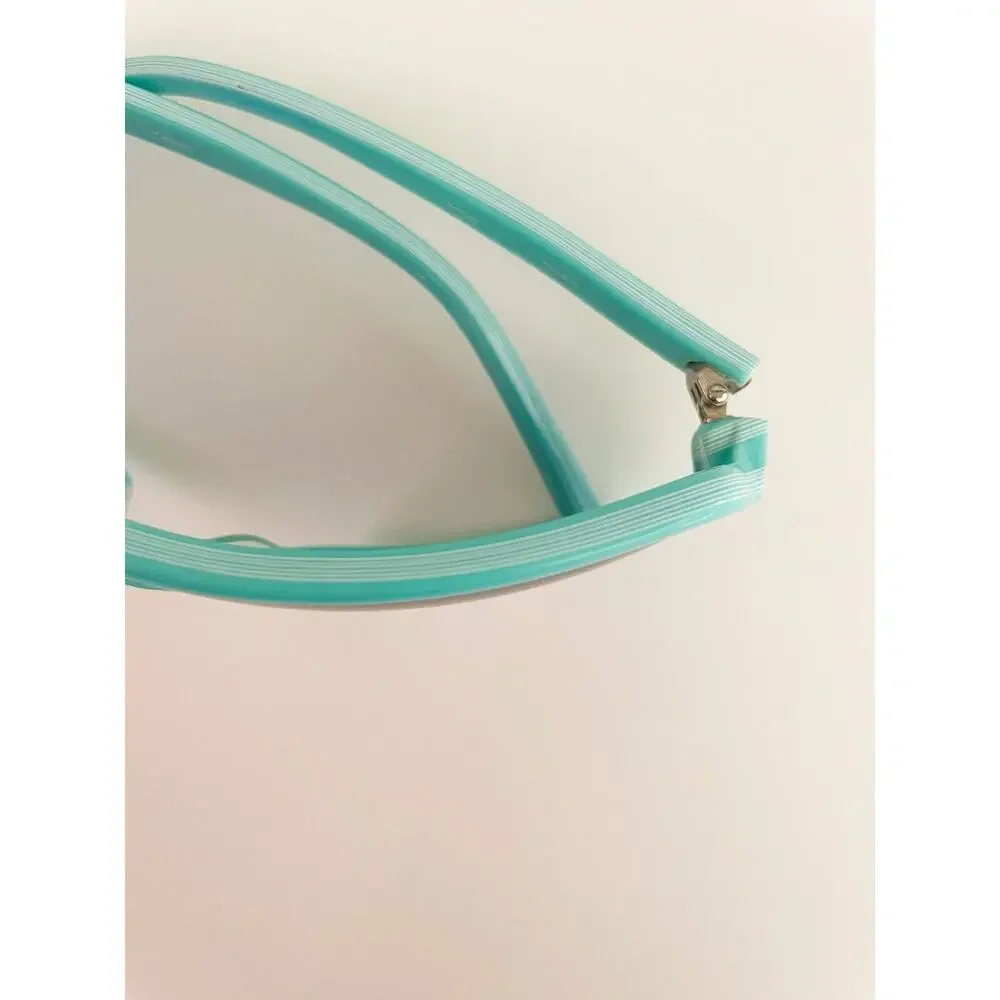 Stussy Mint Green Shield Sunglasses with Gradient Smoke Lenses